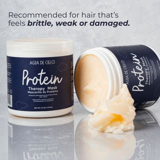 Two jars of AGUA DE CIELO Protein for hair mask are shown on a reflective gray surface with a dollop of the creamy beige mask in front. One jar is closed with a navy label, and the other is open showing the product inside.